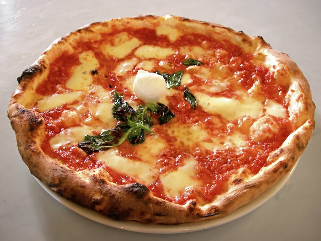 Bella Roma Pizza: Italian Elegance, Flavorful Delights